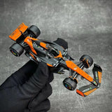 1:43 F1 MCLAREN MCL38 2024 PIT PASS DIORAMA NORRIS